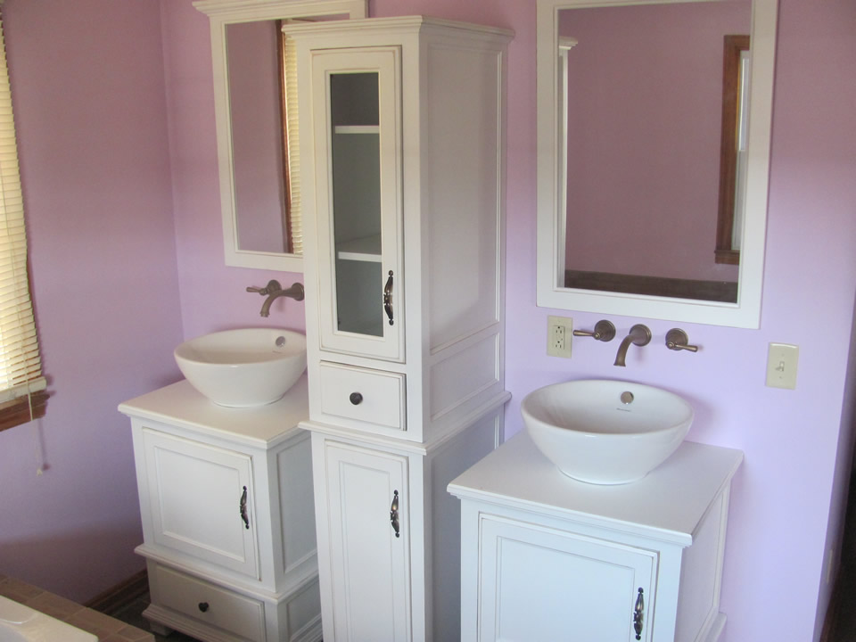 Dual vanities in renovated bathroom